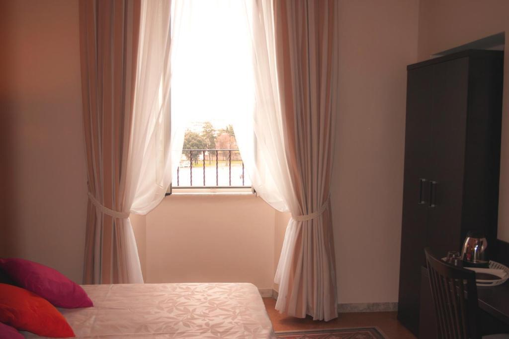 Laterani Suite Roma Habitación foto